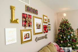 Such a collage can be made as a unified artwork, in one frame, or printed out on some cubes to attach to the wall with no frames. How To Decorate A Gallery Wall For Christmas Unoriginal Mom