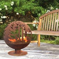 We sell fire pits, fire bowls, fire baskets, patio heaters, pizza ovens, barbecues and chimeneas. Cast Iron Fire Pit Globe With Laser Cut Woodland Pattern Furniture123