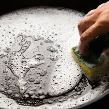 The leftover oil in the pores goes rancid after a while and will make your food taste nasty, even if it isn't rusty looking. How To Clean And Care For Cast Iron Cookware