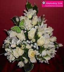 Todays artificial flowers are very realistic and can very often stay looking good for months and don't't require any care, which when compared to real flowers can provide a really cost effective way to provide a lasting floral tribute. Artificial Flowers Grave Pot Ebay Memorial Flowers Blue Flower Arrangements Beautiful Flower Arrangements