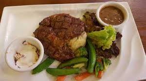 (250gm ±), norwegian salmon fillet seasoned and grilled, served with sauteed vegetables and fries with lemon butter sauce. Me Nate Steak Hub Kuala Lumpur Original Menus Reviews And Prices