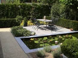 A backyard pond looks great when it is set in the lap of nature. Watertje Garden Pond Design Water Features In The Garden Garden Design