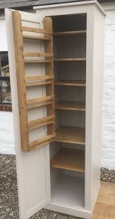 This wood cabinet with white laminate finish features three adjustable shelves, one fixed. Kitchen Unit Larder Pantry Cupboard With Spice Rack Full Length Door Cheshire Pine And Oak