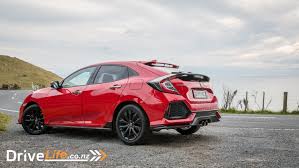 The civic hatchback features an electric parking brake that easily activates with the lift of a finger. 2017 Honda Civic Rs Sport Hatch Car Review Type R Wannabe Drivelife