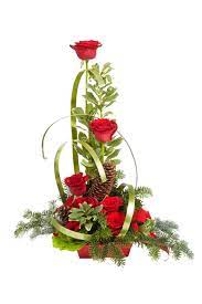 Bead and wire flowers | teaching and creating florals using the techniques of ganutell. Oasis Flat Wire In Apple Green Highlights Long Stem Roses And Pine Cones In An Christmas Flower Arrangements Christmas Floral Arrangements Holiday Arrangement