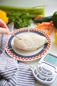 Making boiled chicken (aka poached chicken) is a simple way to get cooked chicken to add to recipes. How To Boil Chicken Breast To Shred Feast And Farm