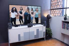 Download Mockup Of A Flat Screen Smart Tv With A Sound System 25877 1 Plyojam