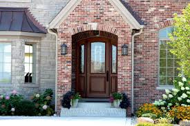 Browse our essential guide to overhauling your exterior with these charming front door design ideas. Arched Doors Exterior Arched Top Doors Mahogany Door Exterior Brick House Paint Exterior Brick House Plans