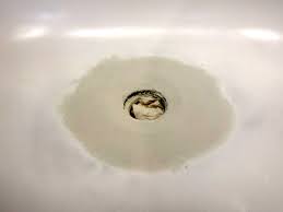 Fiberglass tubs and shower surrounds rarely break apart cleanly. Bathtub Drain Overflow Rust Hole Repair
