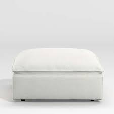 Turned wooden legs on brass casters. Ottomans Cubes Crate And Barrel Canada