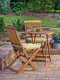 A Small Bistro Set Provides A Cozy Corner For Coffee And Conversation On A Deck Or Balcony Small Patio Furniture Outdoor Chairs Outdoor Bistro Set