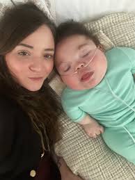 Darla Collins and I are blessed to be with our grandson Praying for Jude  Sullivan Peters at his annual RhizoKids International medical conference at  Children's Harbor