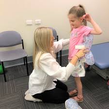 title 🙌 Cannonball! 7-year-old Monique was ready to make a splash after spending 3 years in a full body cast! With the amazing support of our Orthotics team, Monique ditched her cast