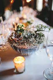 The Best Christmas Centerpieces To Impress Your Guests Rustic Wedding Centerpieces Wedding Floral Centerpieces Rustic Centerpieces