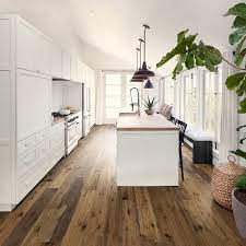 If you decide that wooden floors in your kitchen aren't really for you, you'll be delighted to know that we also offer stone and tile effect laminate flooring if you need any additional advice on picking a new floor for your kitchen, why not talk to us about the options available? Choose The Best Flooring For Your Kitchen Wood Vs Vinyl Vs Laminate Compare Factory