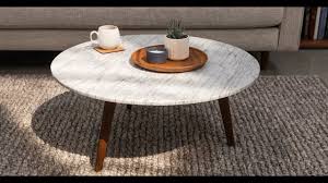 Design within reach ethan allen jonathan adler pottery barn restoration hardware never miss new arrivals that match exactly what you're looking for! Introducing The Mara Marble Coffee Table Youtube