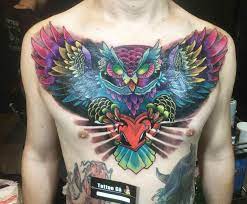 Hình xăm cú mèo trước ngực cho nữ. Xoa Hinh XÄƒm á»Ÿ Ngá»±c Báº±ng Hinh Cu Meo Tattoo Ga