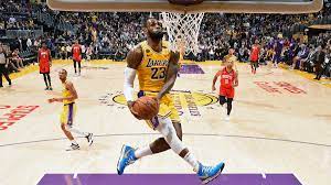 Los angeles lakers star lebron james will play in friday's game against the sacramento kings at staples center after missing the past 20 games because of a right high ankle sprain, the team announced. Lebron James Reverse Dunk Against Rockets Captured In Stunning Photo Cbssports Com