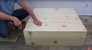 We wanted something with drawers so we could have storage, but without everything being exposed and out in the open. Build An Easy Diy Square Farmhouse Coffee Table Yourself Hometalk