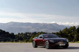 Aston Martin Db11 Looks Divine In Deep Wine Red Carscoops Aston Martin Aston Martin Db11 Aston