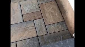 The dining area is made up of the original stamped concrete patio, coupled with brand new mini creta walls to create the sectioned feel. Techo Bloc Patio Using Blue60 In Harvest Gold And Champlain Grey Youtube