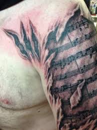 Ripped Skin Music Tattoos For Kids Music Tattoo Horley