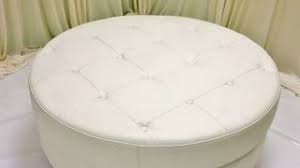 The tufted button design of the ottoman injects the part with some elegance, used to place the finishing touch on your living room or bedroom design. Round White Leather Ottoman Coffee Table Furniture Youtube