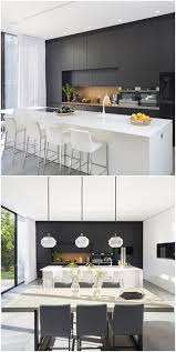 Another Stand Out Feature Of This Simple Yet Modern House Is The Contemporary Black And White Interior Design Kitchen White Modern Kitchen Contemporary Kitchen