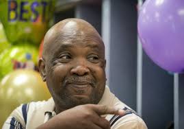 Lake Pointe fifth-graders give to Season for Caring's Ernest Kimble