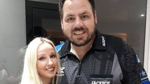 Who is Adrian Lewis' wife and what illness does she have?