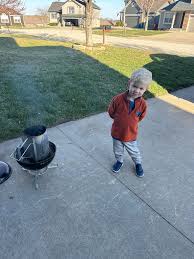 A post I've been waiting to make for a while. For the last year or so he's  been calling the little Smokey Joe in the garage “his grill” and asking  when he