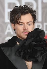 Harry Styles Peplum Suit and Dyed Hair at the Brits 2023