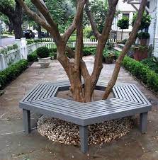 Scroll tubular iron tree bench this stylish bench can be set freely encircled tree, to create a comfortable and good looking place to seat. 17 Wonderful Benches Around The Tree For Memorable Moments The Art In Life Landscaping Around House Diy Garden Furniture Tree Seat