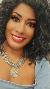 What does the girl cave medallion necklace represent?