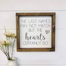 It's time you let your blended family make you the giant you truly are. The Last Names May Not Match But The Hearts Certainly Do Sign Etsy Family Pictures On Wall Blended Family Quotes Blended Family Pictures