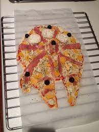With skewers, start sliding strawberries, green grapes or blueberries to create the colored blade of the lightsaber. Star Wars Dinner The Pizza Falcon Star Wars Food Star Wars Themed Food Star Wars Birthday