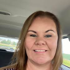 Who can provide wildlife rehabilitation for baby raccoons in Iowa City?