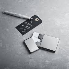 Storing up to eighteen business cards, this cool, sleek and modern business card case is made from top quality stainless steel, a softsatin finish and a polished mirrored edge. To Go Designer Business Card Holder In Steel Georg Jensen