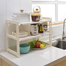 From cabinet organizers to cutlery trays, these unsung heroes will help you declutter your everyday make the most out of your space by adding a few shelf inserts, utilizing all the space between the shelves in your upper cabinets. 2 Tier Multifunctional Removable Board Storage Shelf Kitchen Under Sink Organizer Shelf Buy Under Sink Organizer Shelf Storage Shelf Removable Board Storage Shelf Product On Alibaba Com