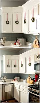 Decorating With Wreaths Indoors Mini Wreaths On Kitchen Cabinet Doors For Christmas Decorating Ki Christmas Kitchen Decor Christmas Kitchen Diy Holiday Decor