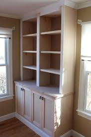 Built In Bookcase With Doors Custom Home Finish Bookshelves Built In Built In Bookcase Bookcase Diy