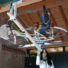 The Hydro Pneumatic Ceiling Bike Rack To Park Your Bike Flat To The Garage Ceiling Raggio Bici Garage Potoloch Bike Storage Garage Bike Lift Bicycle Storage