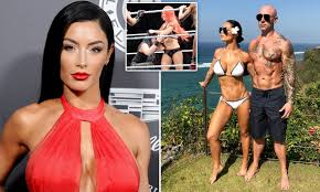 If i recall from the first episode of total divas, she's brunette but because the bellas are already brunette they made her dye it blonde (which pissed of natalya because she's the blonde diva) but then she didn't. Wwe Star Eva Marie Pens Essay About Battle With Alcoholism Daily Mail Online