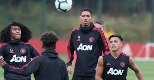 Chris smalling was robbed at gunpoint in front of his wife and toddler son when three hooded men broke into his home. Former Manchester United Star Chris Smalling Held At Gunpoint During Robbery