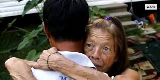 Louisiana woman reunites with hero who saved her and dog from car in flood