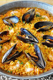 The Most Amazing 20 Minute Seafood Paella Recipe Spain On A Fork Recipe Paella Recipe Seafood Seafood Paella Recipe Spain Seafood Paella