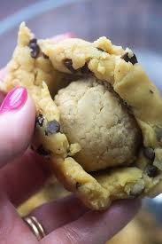 Peanut Butter Ball Stuffed Cookies Recipe Peanut Butter Cookie Dough Peanut Butter Recipes Peanut Butter Balls