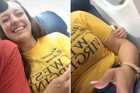 Toddler keeps reaching around plane seat in front to grab woman’s arm  during entire flight