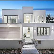 The white entry door on a dark gray house is a classic look that works nicely on just about any style or size home. 52 Best Exterior House Paint Ideas Designs For 2021