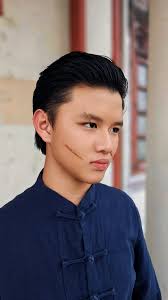 🕰️ 同一个阿明，不同的命运。 当历史被改写，纯真的笑容，也能变成冷冽的锋芒。 🔫  一转身，我不再是善良少年，而是1930年代最狠的角色——黑化阿明。 🎬 谢谢《命运使者